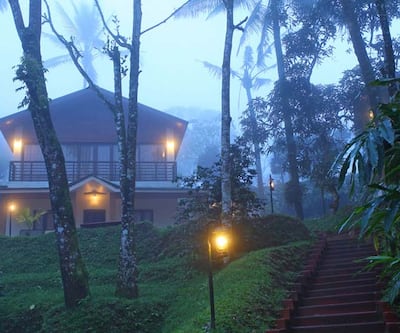 https://imgcld.yatra.com/ytimages/image/upload/t_hotel_yatra_city_desktop/v1430995692/Domestic Hotels/Hotels_Thekkady/Carmelia Haven The Plantation Resort/EXTERIORVIEW1.jpg